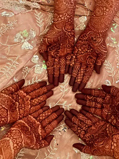 A group shot of beautiful, dark henna stains. This is what happens when good art meets good henna paste.