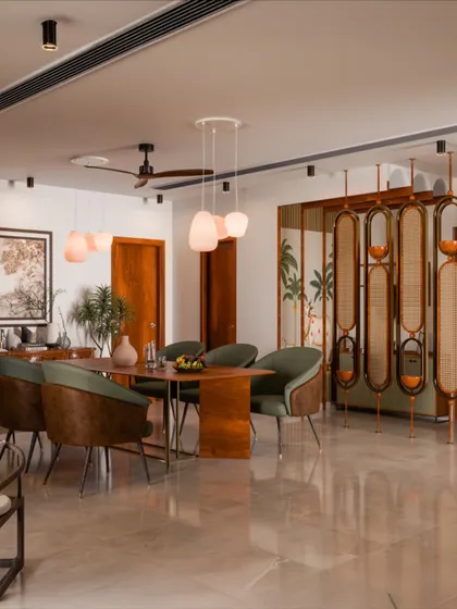This dining space is all about creating a warm, inviting atmosphere. I combined rich wood finishes with soft green chairs and a beautiful cane partition to add texture and charm. The pendant lights and brass accents bring just the right touch of elegance for memorable dinners.