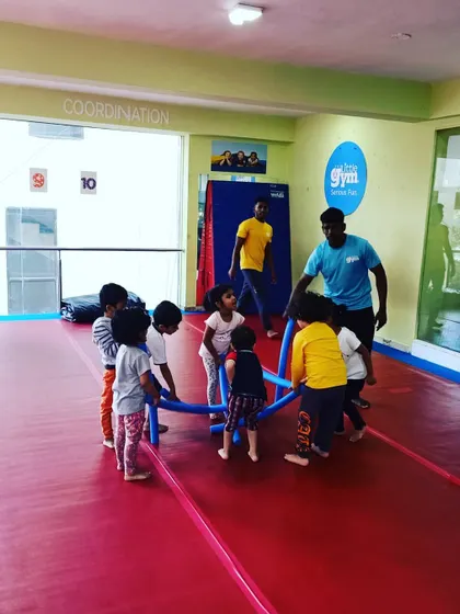 Our "Funny Bugs" class using softy sticks during their warm-up. This group activity is great for coordination and encourages kids to play and learn together.