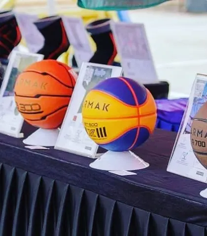 A duplicate close-up of the branded basketballs on display.