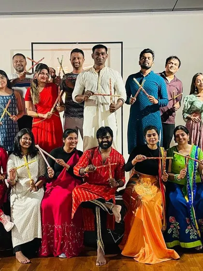 A great group photo capturing the festive spirit of our Dandiya night.