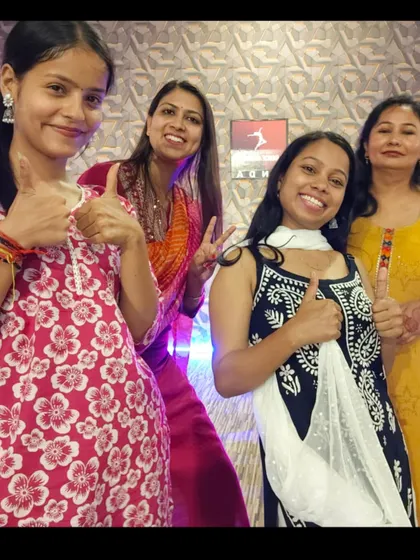 Peace and thumbs-ups! Celebrating another successful and fun-filled dance class.