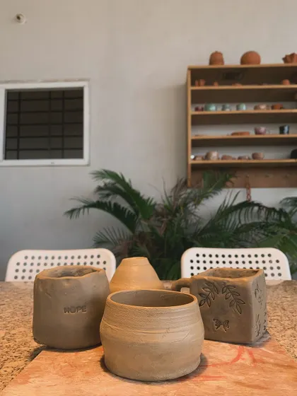 Another view of the raw pieces, with the "HOPE" pot in the foreground.