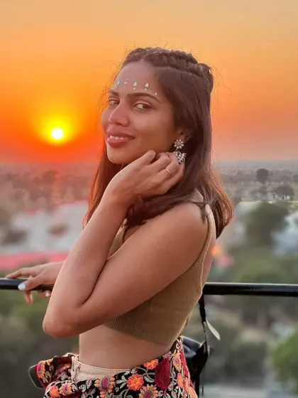 I love this shot from the Magnetic Fields festival. The simple, elegant bindi-style face gems catch the sunset perfectly, creating a beautiful and ethereal festival look.