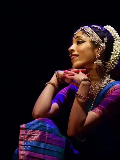 A serene portrait capturing the essence of a Gopika's devotion. The traditional attire and jewelry are beautifully detailed in this shot.