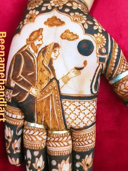A closer look at the Karwa Chauth portrait mehandi. I can customize the portraits to match the couple's attire and features.