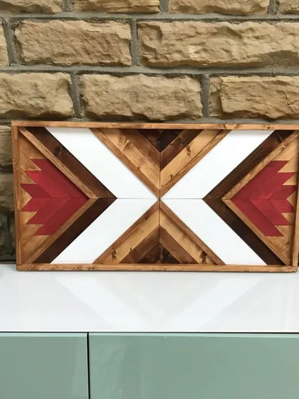 A centered view of the Aztec-inspired wall art, allowing the powerful 'X' pattern and bold colors to take center stage.
