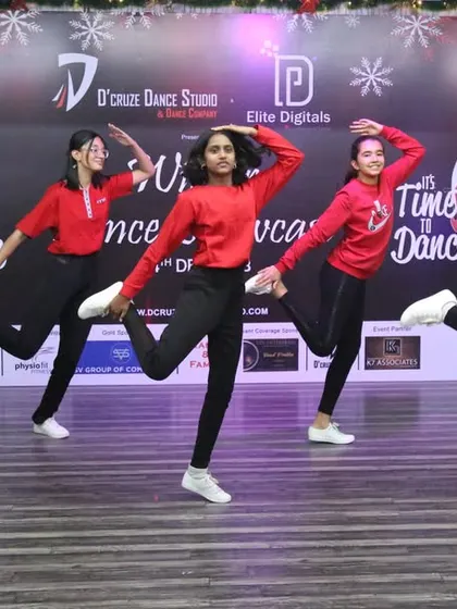 A fun, coordinated kick line from the girls' group dance at the Winter Showcase.