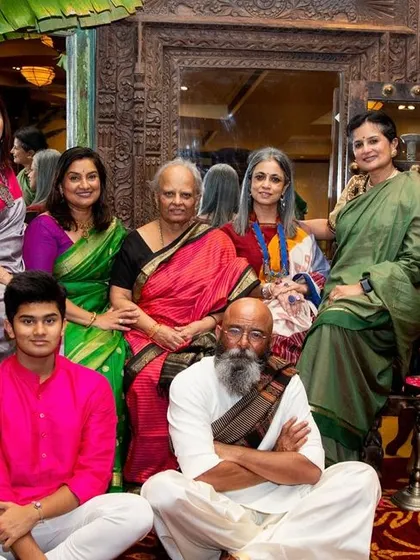A group photo from the book launch, surrounded by traditional decor and artifacts that reflect the culture of Tulunadu. The event was a celebration of community, history, and shared heritage.