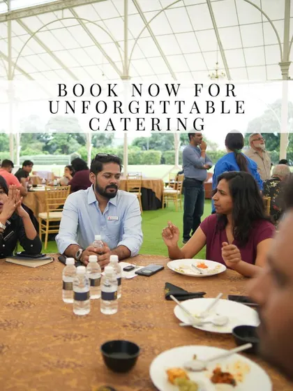 Guests enjoying a meal and conversation at a corporate event. This image captures the comfortable and professional atmosphere we create with our catering and hospitality services.