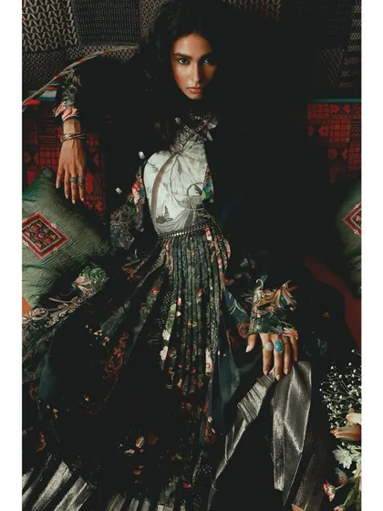 A rich, layered composition from the "Roots" series. The mix of textures, patterns, and deep colors explores the complexity of our personal and cultural foundations in this fashion photography story.