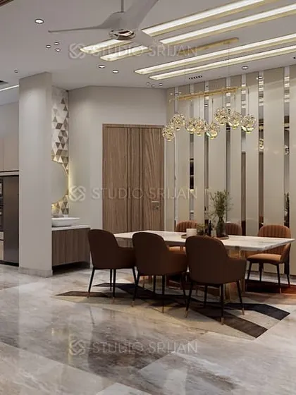 The dining area in a Bali Nagar, New Delhi home, featuring a striking geometric-patterned rug and a wall of vertical slats that acts as a semi-transparent screen.