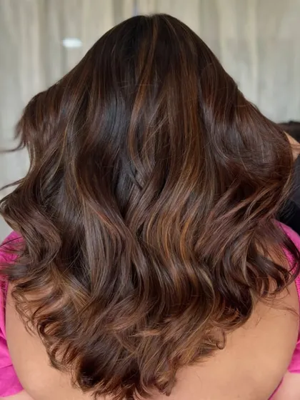 The back of the caramel brown swirl, showing the beautiful waves and rich, multi-tonal color.