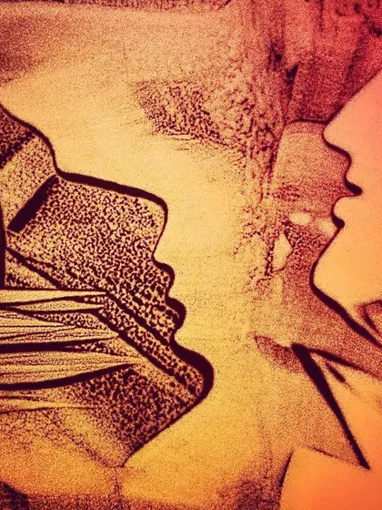 This sand painting, 'Varne SuVarne', explores the interaction between two profiles. It is an example of my contemporary artwork, where I use sand to explore human connection and emotion.