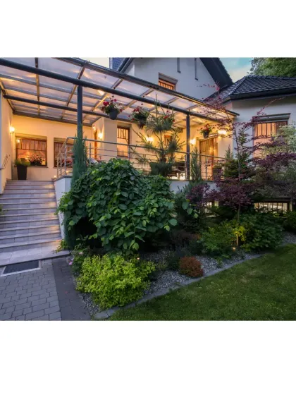 A great landscape design truly comes alive at night. Strategic outdoor lighting can completely transform your space, highlighting beautiful trees, defining pathways, and creating a warm, inviting atmosphere. We plan lighting as a key part of the overall design to make your garden enjoyable day and night.