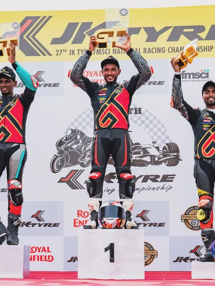 This is the culmination of a successful race weekend at the Royal Enfield GT Cup. I am on the top step of the podium, celebrating a hard-fought victory with my fellow competitors.