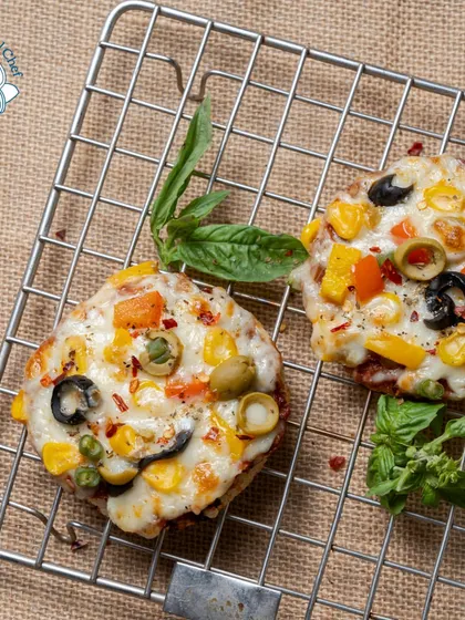 A fusion of Italian and Indian, our Kullad Pizza is baked in a traditional clay pot for a unique, rustic flavor.