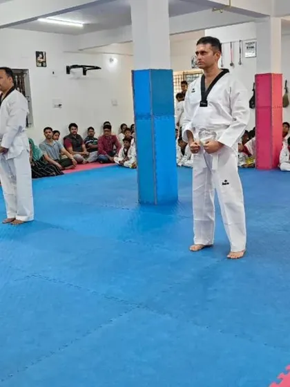 Two senior students stand ready to begin their demonstration.