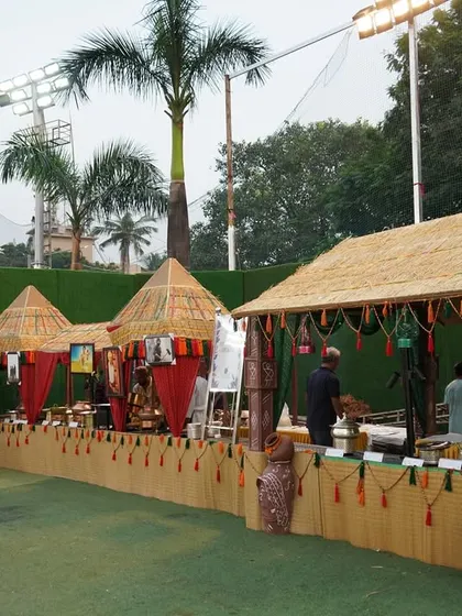 I can transform any space with themed catering. Here, I created an entire village-themed food festival for an outdoor event, complete with rustic stalls and traditional decor to offer a truly immersive culinary journey.