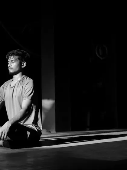 Finding peace in the chaos. A moment of quiet reflection for one of our boxers after a grueling workout.