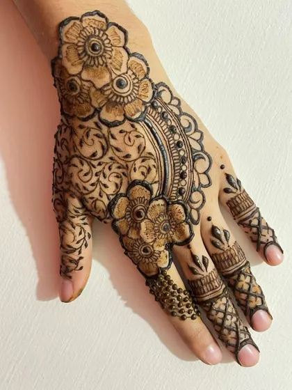 Another angle of the semi bridal design, showcasing the intricate vine work filling the background.