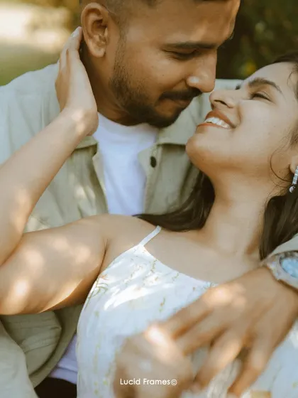 A beautiful close-up of the couple's happy and intimate interaction, showcasing genuine smiles and connection.