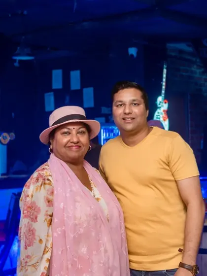 A couple dressed up for a fun night out.