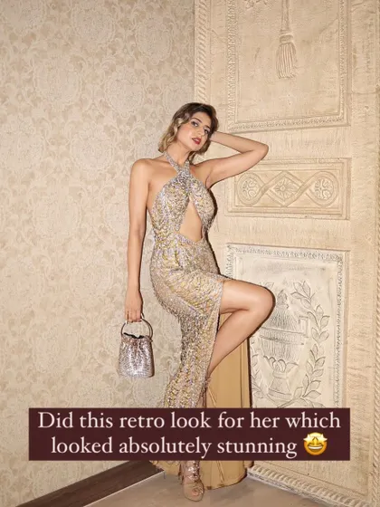 A dynamic pose that captures the stunning details of the retro dress and the confident, glamorous makeup.