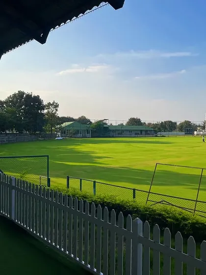 The view from our pavilion overlooking the lush green field. It's a sight that inspires passion and dedication every single day.