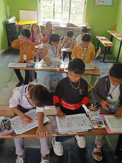 Another view of our classroom at Amara Vidya Niketan during the art competition. We ensure every child has the space and materials they need to bring their imaginative ideas to life.