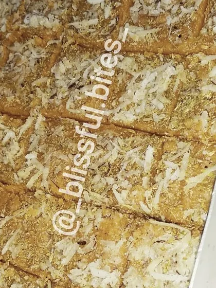 A tray of freshly cut Gur Paapdi. The combination of jaggery and wheat flour creates a unique flavour that brings back childhood memories.