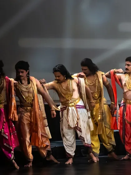 The brotherhood of the Pandavas is shown here through synchronized poses and strong stage presence. Group choreography for male dancers often emphasizes unity and strength, which is central to many epic tales.