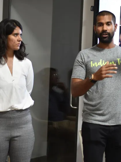 Our co-founders Chris Marquis and Shreya Pasricha during a presentation. We are committed to guiding young athletes through the complex process of securing a spot in a US college.