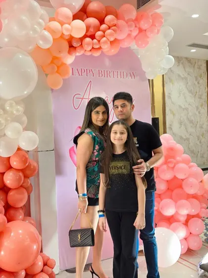Another family photo, capturing the joy of the celebration.