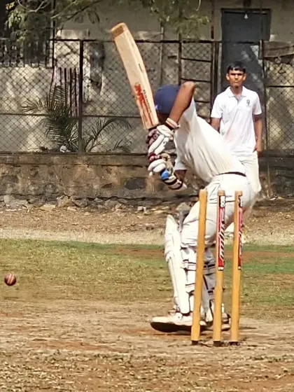 An action shot from the nets showing a batsman connecting with the ball. Our net sessions are designed to simulate match conditions, helping players improve their shot selection and timing.