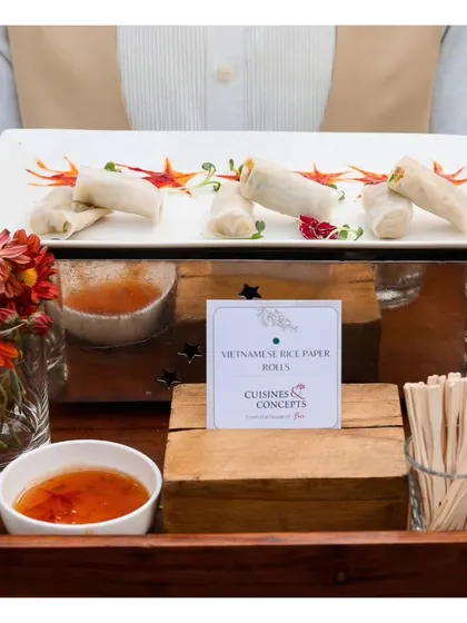 Freshly made Vietnamese Rice Paper Rolls, a light and healthy appetizer option, served with a sweet chili dipping sauce.
