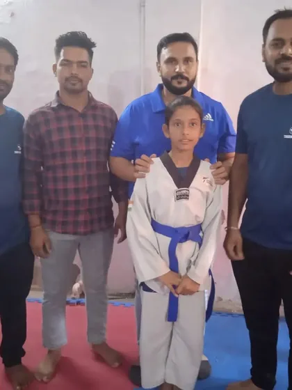 A student with the examiners after her test. We invite senior masters to ensure our evaluations are fair and up to standard.