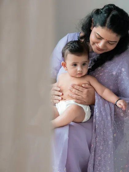 A mother's embrace is a world of comfort. This tender moment between a mother and her baby was captured with soft, natural light to highlight their gentle bond. My goal is always to create a calm atmosphere where these quiet, loving interactions can unfold naturally.