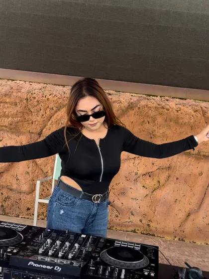 Another shot of me embracing the outdoor party vibe from behind the decks.