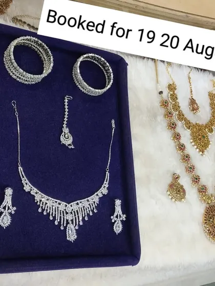 Another set of bookings, showing a client's choice of a simple diamond-look set for one function and a traditional ruby haram for another.