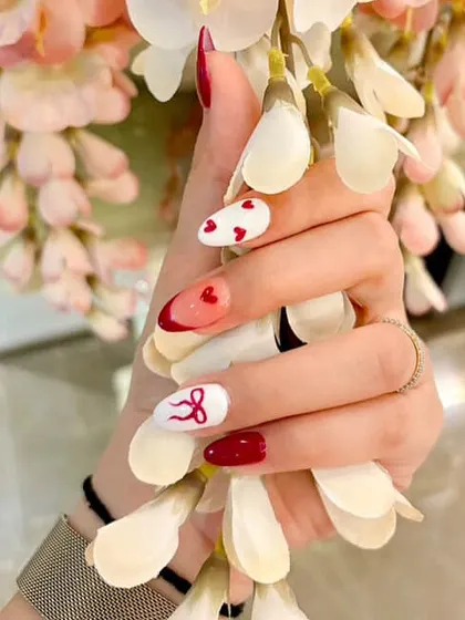 A sweet and romantic set, perfect for Valentine's Day or any day you're feeling the love. We hand-painted tiny hearts and delicate red bows.