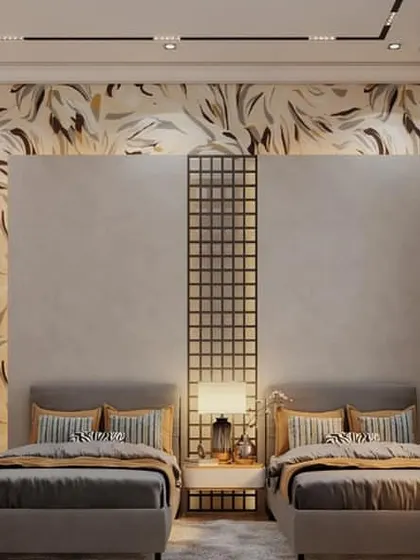This shared bedroom for two children uses a symmetrical layout with a decorative screen between the beds. The abstract, leafy wallpaper adds a sophisticated yet playful touch to the room.