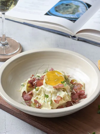 My signature handmade pasta carbonara, with a perfectly runny egg yolk on top.