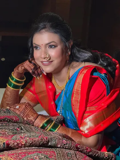 A moment of quiet reflection for my Maharashtrian bride. Her makeup is soft and natural, enhancing her beauty without overpowering the traditional elegance of her saree and jewellery.