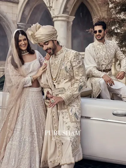 A celebration of regal elegance and unforgettable moments. The coordinated attire of the couple and groomsman creates a powerful and stylish statement.