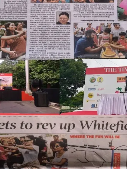 A collage showing my stage setup and the newspaper feature for Happy Streets.