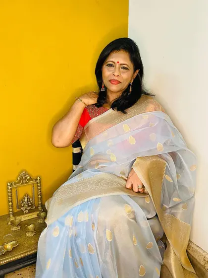Another look at the grey organza saree, showing how beautifully it catches the light. It’s a very down-to-earth yet stunning piece.
