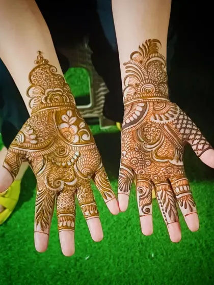 A beautiful Indian mehandi design with a mix of floral and paisley motifs, perfect for any celebration.