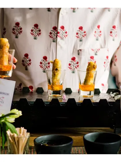 Another view of our shot glass spring rolls, highlighting the clean and sophisticated presentation style.