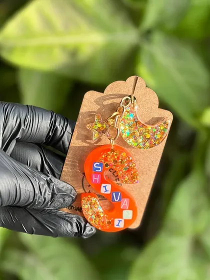 Another custom keychain, this one with a moon and star charm. I can add different charms to match your personality.